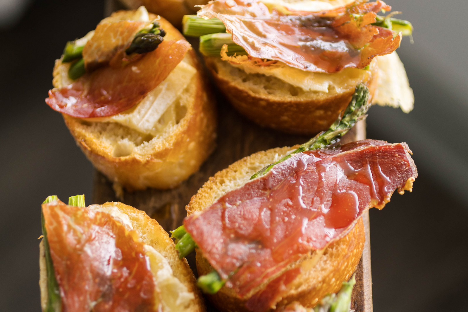 Crispy Prosciutto, Asparagus, and Green Hill Crostini