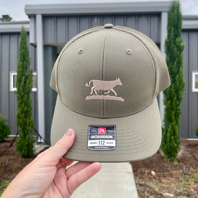 The front of a Richardson hat with the Sweet Grass Dairy logo